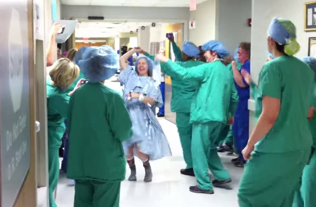 Rather than sulking into the OR for a double mastectomy, this patient chooses to dance with her doctors and nurses!