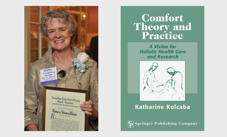 Experienced nurse holding award and book on comfort theory and practice for holistic health care.